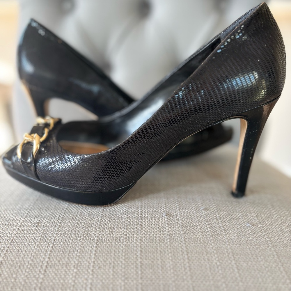 ANTONIO MELANI Chic Black Heels with Gold Accent